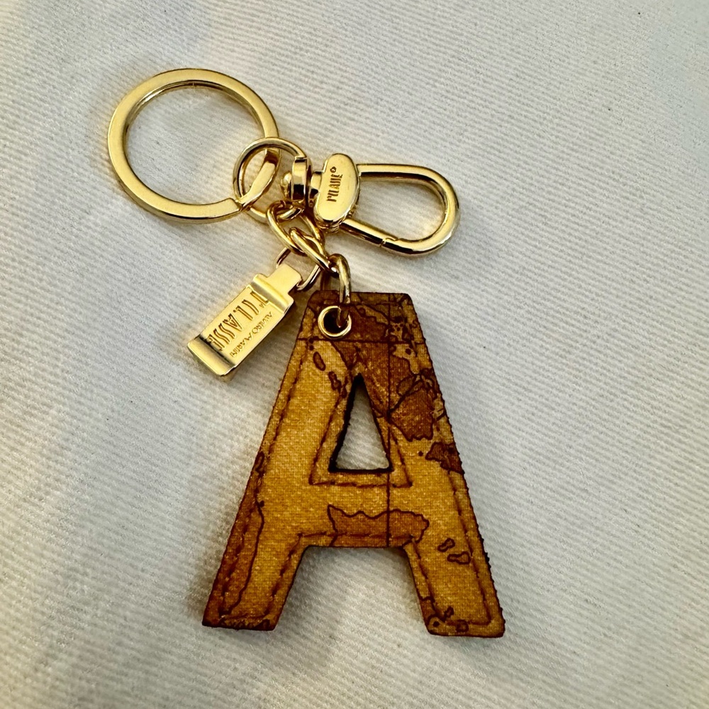 Alviero Martini Gold and Brown Key Holder. Made in Italy.